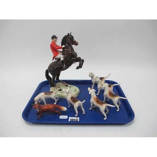 1058 - Beswick Rearing Huntsman 868, 23cm high, six hounds and fox.