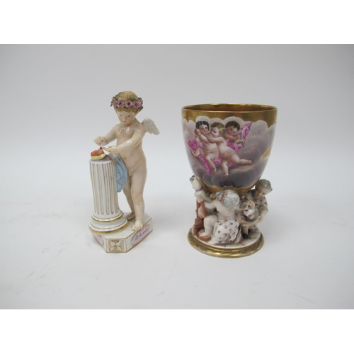 1063 - A Late XIX/Early XX Century Meissen Porcelain Model of a Cherub, standing beside a column, the shape... 