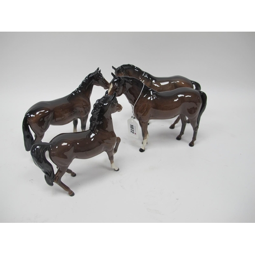 1072 - Beswick Pottery Horses, in brown, the largest 19cm. (4)