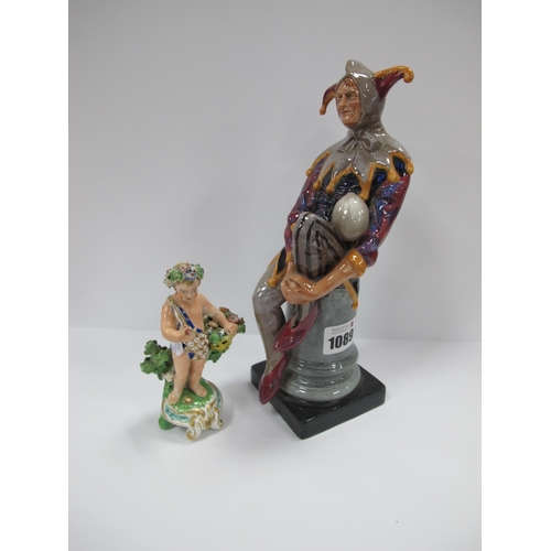 1089 - A Royal Doulton Pottery Figure 'Jester', HN 2016, 24.5cm high; An Early XIX Century Model of a Cheru... 