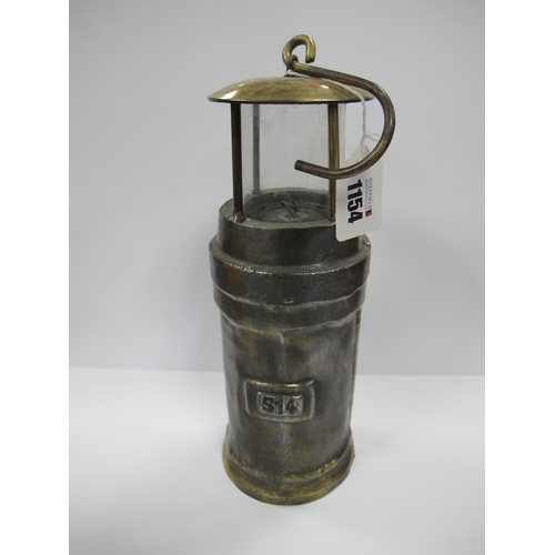 1154 - Miners Lamp, crudely constructed, applied '514; to body, stcm high with handle down.