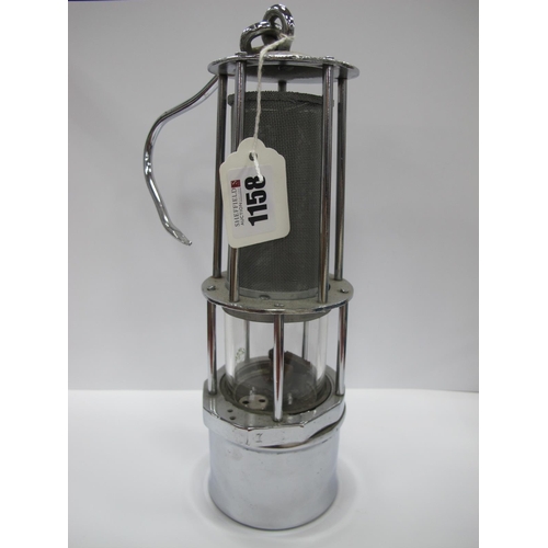 1158 - Miners Lamp, in chrome, five bars surmounting gauze and five smaller around glass, 27cm high with ha... 