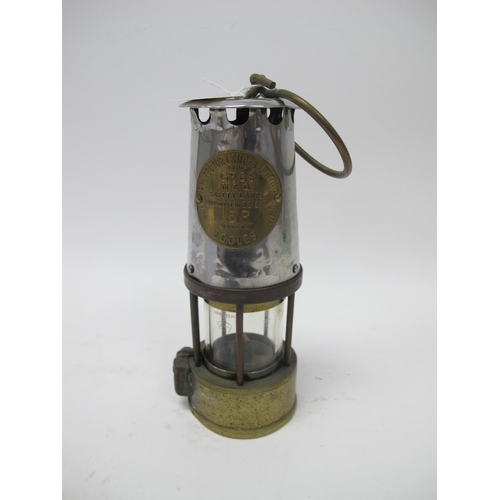 1186 - Miners Lamp The Protector, Eccles, type G&6S, M&Q, numbered 38, 24cm high, with handle down.