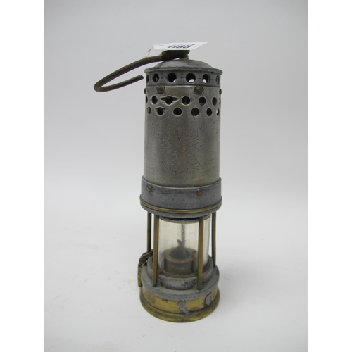 1195 - Miners Lamp, GKN to aluminium body, 56 & 2 to brass lower section, 26cm high with handle down.