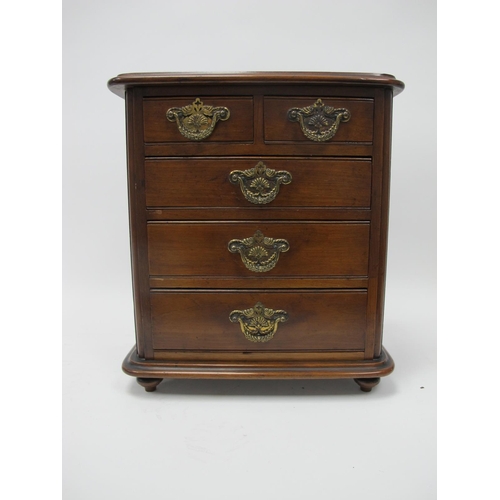 1202 - A Late XIX Century Apprentice Miniature Mahogany Chest of Drawers, of three long and two short drawe... 