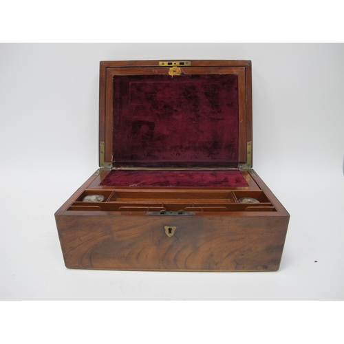 1203 - A XIX Century Mahogany Writing Slope, top with a brass shield insert, brass escutcheon, fitted inter... 