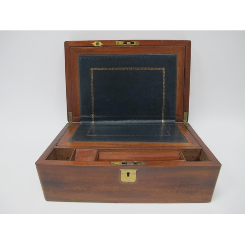 1214 - A Late XIX Century Mahogany Writing Slope, with brass cartouche to the lid, the interior with dark g... 