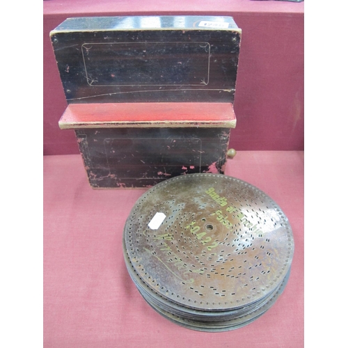 1246 - A Late XIX Century Polyphone Disc Player, of rectangular form with sloping support, wind-up handle a... 