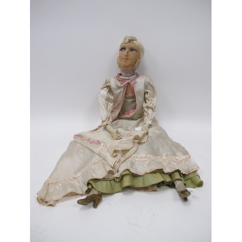 1251 - An Early XX Century Boudoir Doll, in the Norah Wellings style with fabric face and body, with painte... 