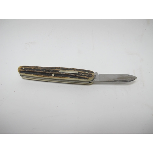 1315 - Stan Shaw: A Two Blade Knife, with stag scales and brass linings, 8.5cm closed.