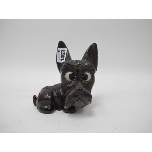 1463 - A German Carved Composite Novelty Scottie Dog Clock, with rolling eyes to tell the time, 14cm high.