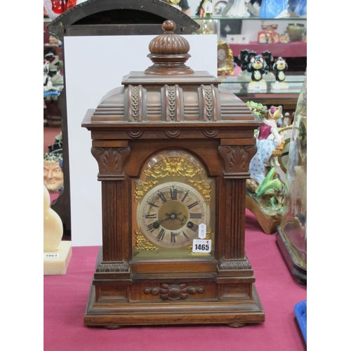 1465 - A Late XIX Century Walnut Cased Mantle Clock, with melon finial, reeded sides, eight day Junghans mo... 