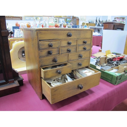 1469 - A Late XIX Century Pine Miniature Chest of Drawers, each with twelve assorted drawers containing a v... 