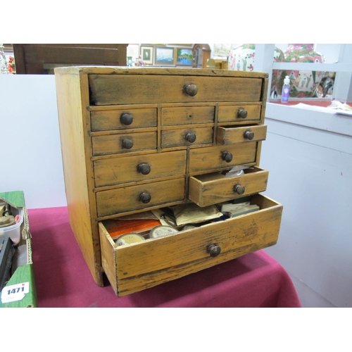 1470 - A Late XIX Century Pine Miniature Chest of Drawers, each with twelve assorted drawers containing a v... 