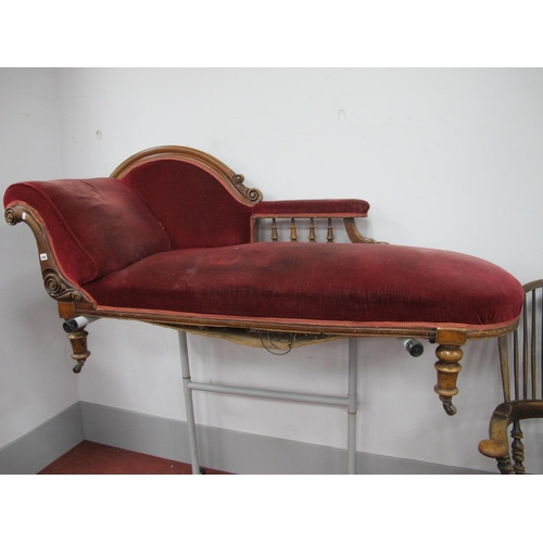 1484 - A XIX Century Mahogany Chaise Longue, with turned spindles to padded arm, scroll supports to padded ... 