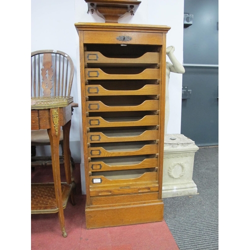 1491 - An Early XX Century Oak Filing Cabinet, the top with moulded edge, tambour front to internal shelves... 