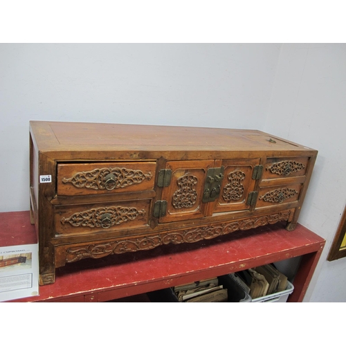 1500 - A Chinese 'K'ang Cupboard, the top with cupboard door, two small drawers with carved decoration, two... 