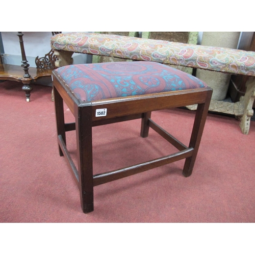 1502 - An XVIII Century Mahogany Rectangular Shaped Stool, with drop-in seat, square chamfered supports uni... 