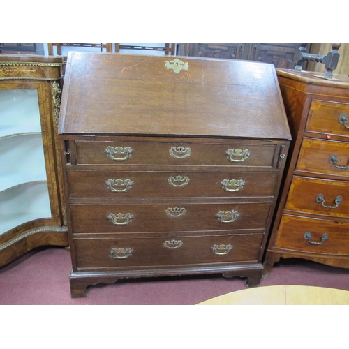 1521 - An XVIII Century Oak Bureau, with hinged fall to fitted interior over four long drawers on bracket f... 