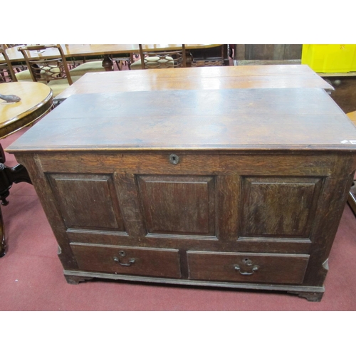 1529 - An XVIII Century Oak Mule Chest, with hinged top, triple panelled base over two drawers on bracket f... 