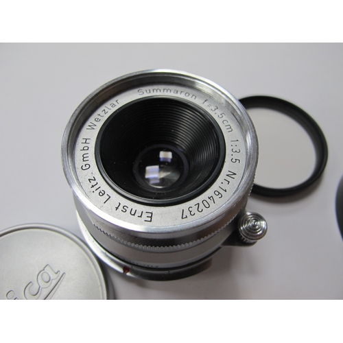 1298 - A Leitz Summicron F=3.5 cm 1:3.5 Camera Lens, Nr. 1640237, Hota 39mm UV filter.