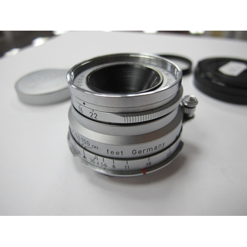 1298 - A Leitz Summicron F=3.5 cm 1:3.5 Camera Lens, Nr. 1640237, Hota 39mm UV filter.