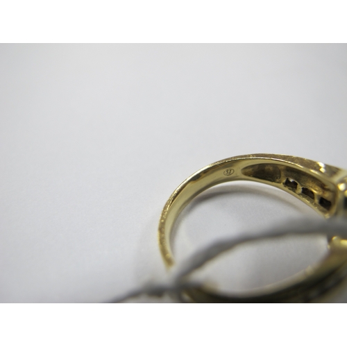 112 - An Australian Black Opal and Diamond Set Dress Ring, oval cabochon collet set to the centre, between... 