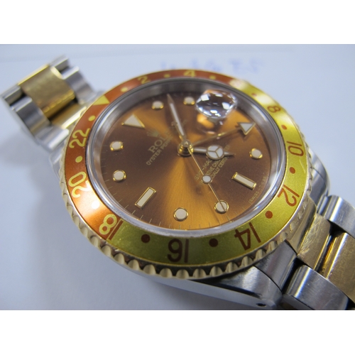 150 - Rolex; A c.1991 GMT Master 'Root Beer' Bi-Metal Automatic Gent's Wristwatch, Model: 16713, Serial No... 
