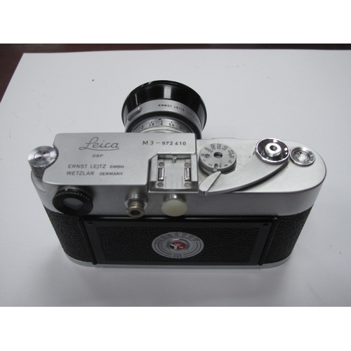 1326 - A Leica M3 Rangefinder Camera, 1959, chrome, serial No. 972410, with Leitz Summicron F=5cm 1:2 lens,... 