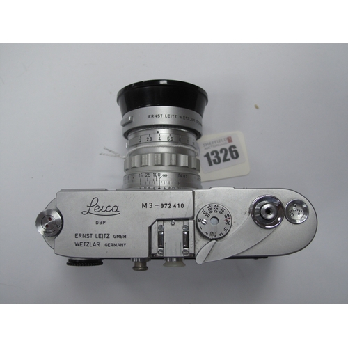 1326 - A Leica M3 Rangefinder Camera, 1959, chrome, serial No. 972410, with Leitz Summicron F=5cm 1:2 lens,... 