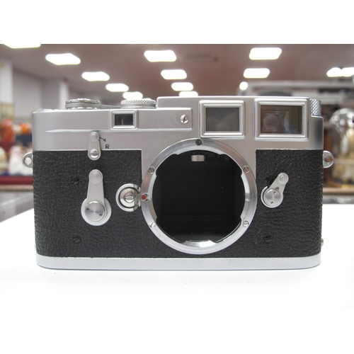 1326 - A Leica M3 Rangefinder Camera, 1959, chrome, serial No. 972410, with Leitz Summicron F=5cm 1:2 lens,... 