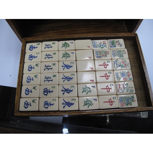 1137 - A Chad Valley Co Ltd Mah-Jong Set, the wooden case with five pull-out drawers containing composition... 