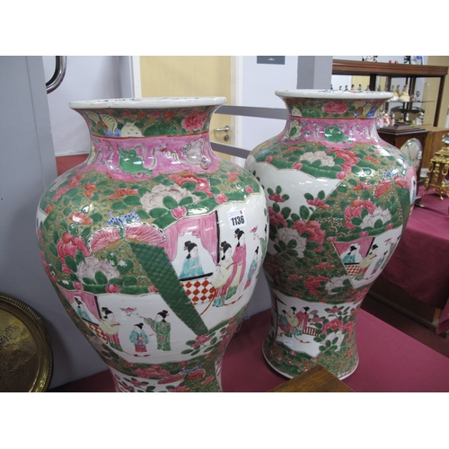 1136 - A Pair of Chinese Famille Rose Porcelain Vases, the panels decorated with female figures with furthe... 