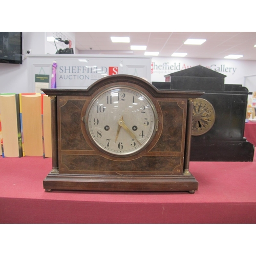 1461 - An Early XX Century Mahogany Mantel Clock, with an arched top, silvered dial, Arabic numbers, column... 