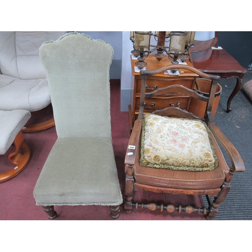 1547 - A XIX Century Upholstered Chair, on turned supports; together with an early XX Century armchair (2) ... 