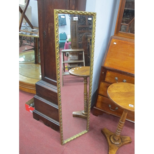 1659 - A XX Century Gilt Rectangular Shaped Wall Mirror, with foliage decoration, 34.5 x 122cm.