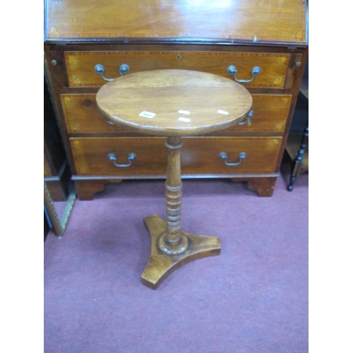 1661 - A XIX Century Style Oak Pedestal Table, with a circular top, turned pedestal, on a triform base, 64c... 