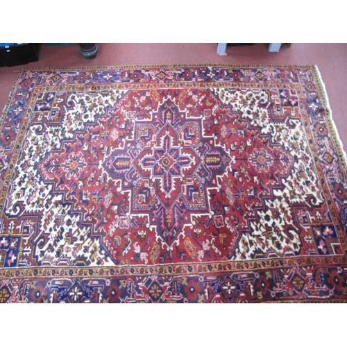 1630 - A XX Century Persian Style Wool Carpet, border with floral and lozenge decoration, red ground centra... 