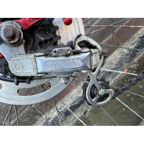 302B - A 1970's Raleigh ACE, 'Racing' Bicycle in Red, 5-speed Huret gears with original dynamo lighting.