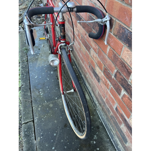 302B - A 1970's Raleigh ACE, 'Racing' Bicycle in Red, 5-speed Huret gears with original dynamo lighting.