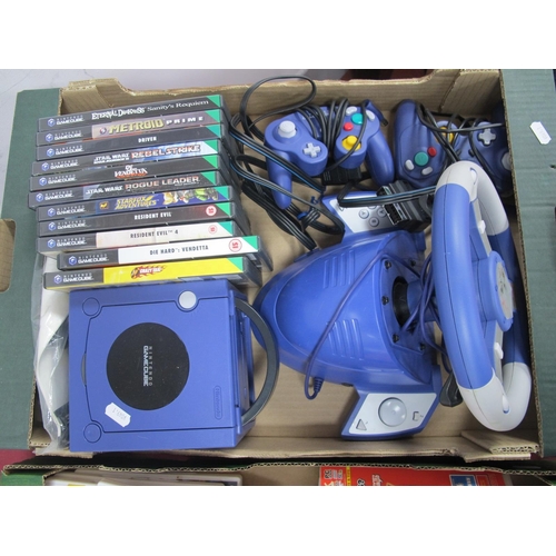 556 - A Nintendo Gamecube Games Console, two controllers, Play on X-Racer steering wheel, accessory, games... 