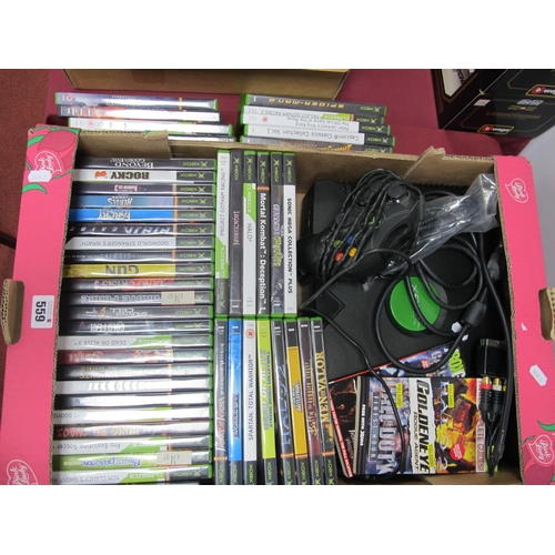 559 - An Original Circa 2003 Microsoft X Box Games Console, one controller, cables (untested), together wi... 