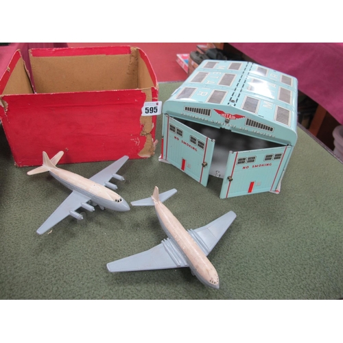 595 - A Circa 1950's Mettoy Tinplate 'Metair' Hangar, fitted with two front sliding doors; together with t... 