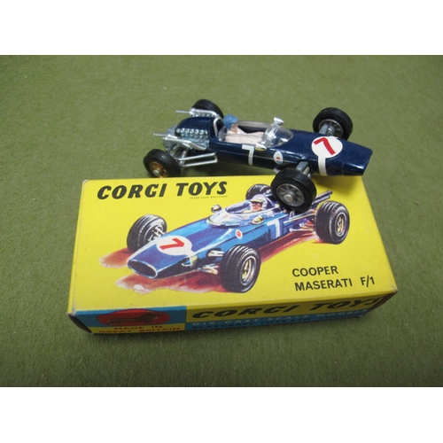 678 - A Boxed Corgi Toys #156 Diecast Model Cooper Maserati F/I, Car No 7, pen writing to one end flap.