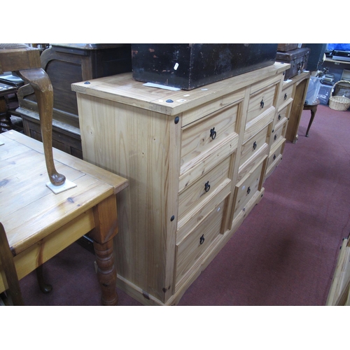 1544 - A Pine Chest of Drawers, with six small drawers, on a shaped plinth base, with stud decoration, 133c... 