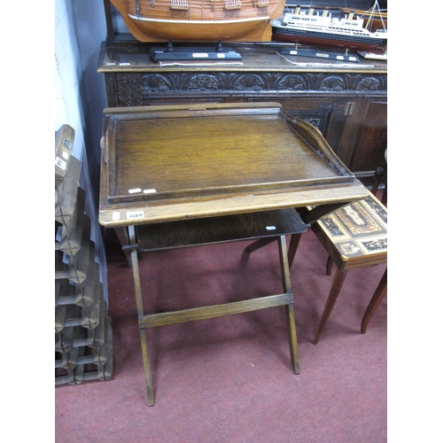 1589 - A 1930's Oak Butlers Stand, with a tray top and under shelf.