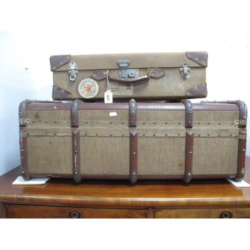 1602 - A Wooden Bound Hessian Trunk, 86cm wide, hessian trunk with leather corner mounts, 62cm wide. (2).