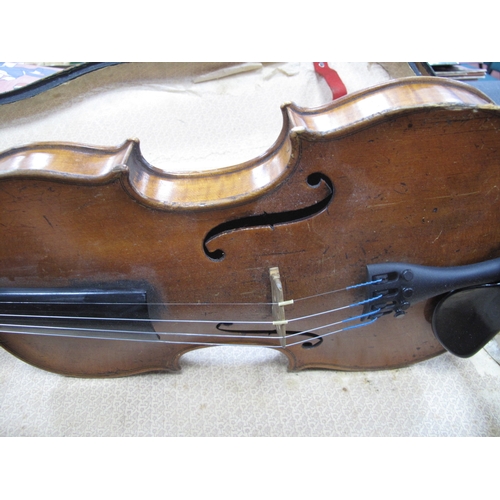 1420 - Violin Circa 1900, with one piece back, together with bow, in case.