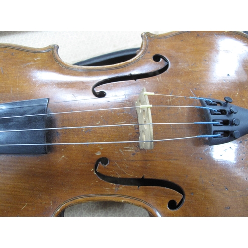 1420 - Violin Circa 1900, with one piece back, together with bow, in case.