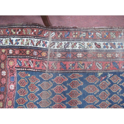 1539 - A Middle Eastern Wool Runner, with allover geometric motifs, on blue centre ground approximately 300... 